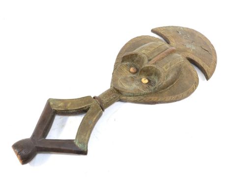A Kota Shamaye Figure, with recessed oval face, bone button eyes below domed forehead and fanned coiffure, covered in strips 