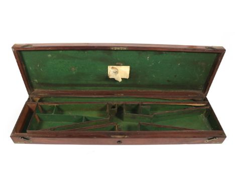 A 19th Century Brass Bound Mahogany Shotgun Case, the hinged cover with inset brass ring handle, opening to reveal green baiz