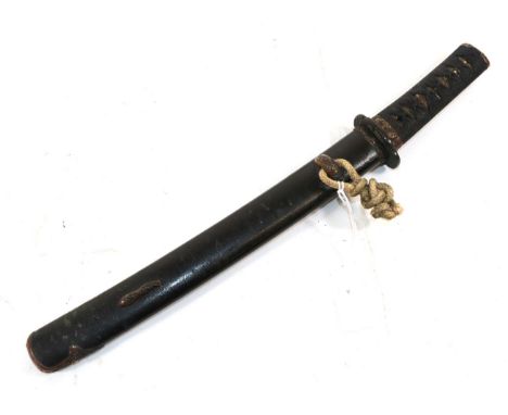 A Japanese Koto Tanto Dagger, the 21cm steel blade with wide undulating hamon, the tang with two mekugi ana, line engraved br