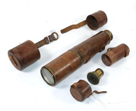 A First World War Military Brass Single Draw Telescope, with 5cm lens, stitched leather sleeve, anti-glare hood, the tube sta
