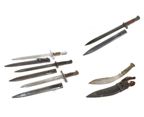 A Czechoslovakian Post War VZ24 Mauser Bayonet, the pommel with tgf maker's mark, with steel scabbard; a Very Similar Bayonet