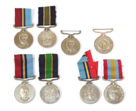 A Collection of Eight Rhodesian General Service &amp; Police Medals:- to 14551 Const Kadhela; 14541 Sgt Kaondera; Police LSGC