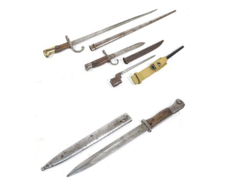A French Model 1872 Gras Sword Bayonet, with St Etienne T section steel blade, the steel crossguard stamped 39390, with wood 