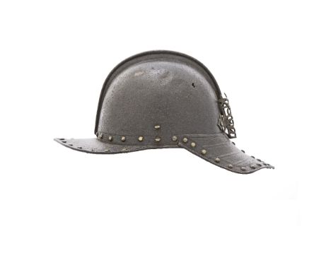 A Rare French Officer's Pot Helmet  Second Quarter Of The 17th Century Of blackened iron, with rounded two-piece skull with l