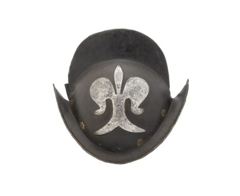 A German Black And White Comb MorionCirca 1600Of similar form to the last, embossed on each side of the skull with a stylised