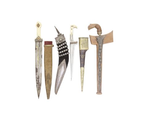 A Group Of Eastern DaggersMostly 19th CenturyComprising a Caucasian kindjal with double-edge blade (patches of rust and pitti