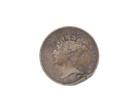 A Rare 'Oakley' 1854 Penny Coin  The obverse stamped 'OAKLEY', the edge deformed by shot strike Footnotes: Annie Oakley's act