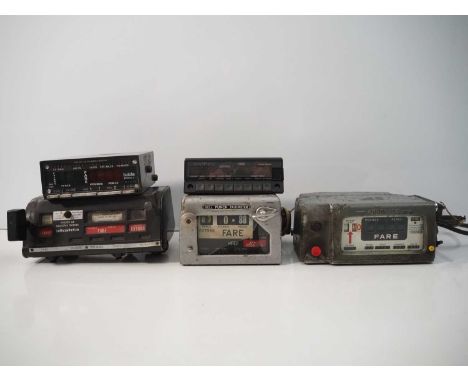 A Collection of 5 vintage taxi meters; A Swedish Halda Model 9, a Swedish Garphyttan Haldex AB, an Argomatic, A Bell Punch Ta