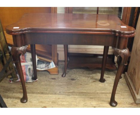 A George II mahogany card table