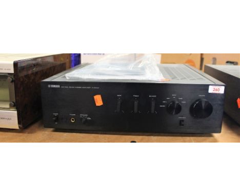 A Yamaha Amplifier AS1000 - heavy duty item and excellent playback quality