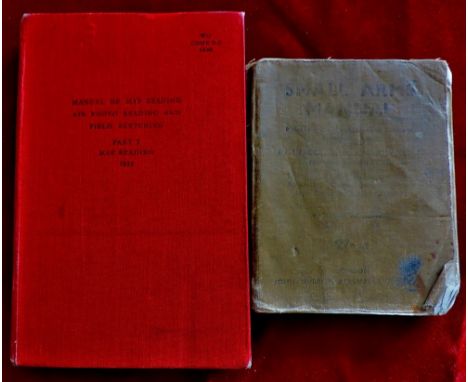 World War II  books including 'Small Arms Manual (1942)' and a manual of 'Map Reading Air photo Reading and Field Sketching'.