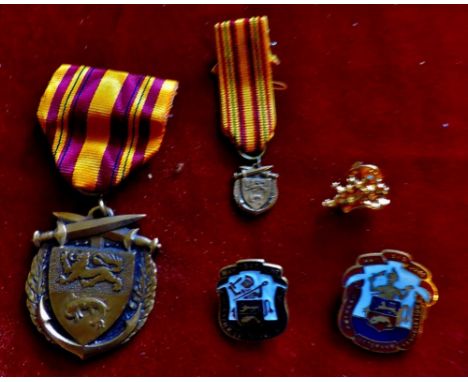 Five medals from the Dunkirk Veterans association includes: The Dunkirk Medal with its miniature, Gilt enamel D.V.A. Lapel ba