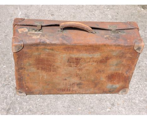 Vintage brown leather well travelled suitcase with a vintage Kodak box Brownie. Excellent condition. 