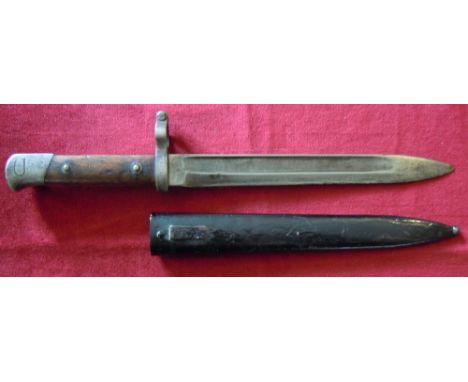 Czechoslovakian K.V. Mauser bayonet with markings 24.J.B. 1569.  In fair condition with a painted scabbard and notched blade.