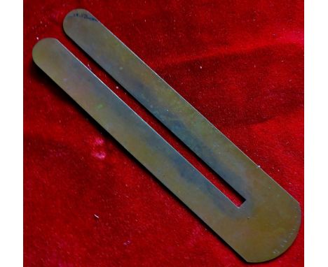 WWI brass button cleaner rod protector.  No markings.