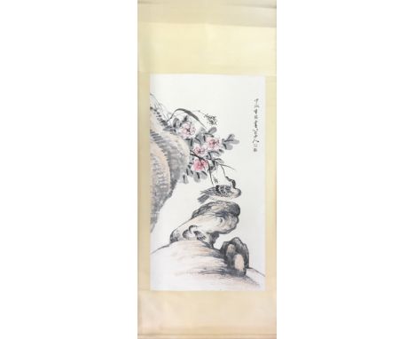 A Chinese silk mounted scroll painting of birds on a rock, W. 91cm L. 212cm.