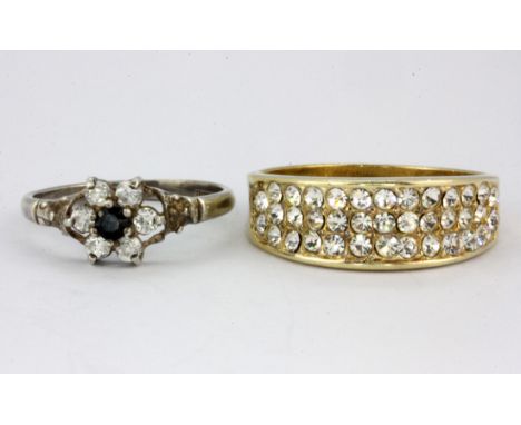 A hallmarked silver cluster ring together with a 925 silver gilt stone set ring, (M.5 &amp; S).