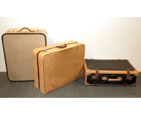 Three vintage suitcases, largest size 65 x 39cm.
