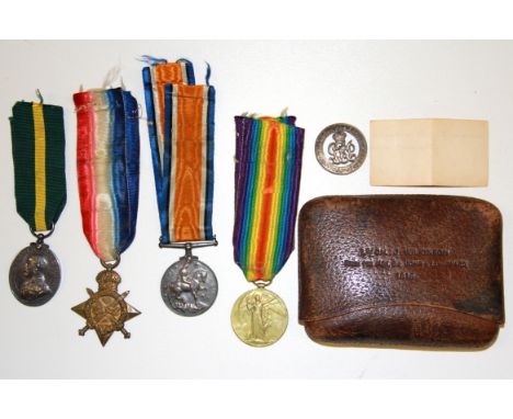 A leather pouch stamped for Lance Corporal J. Wilkinson presented by the Hon. Sir John &amp; Lady Ward 1918 with medal conten