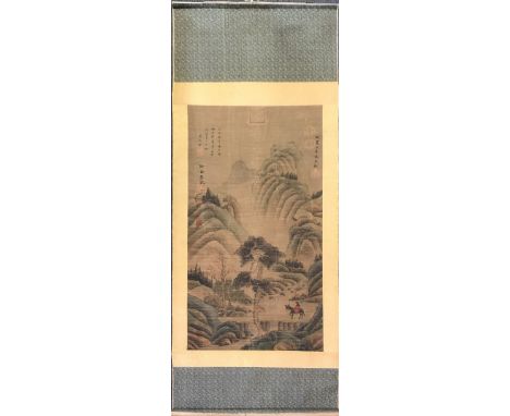 A Chinese silk mounted scroll painting of a landscape, W. 87cm L. 206cm.