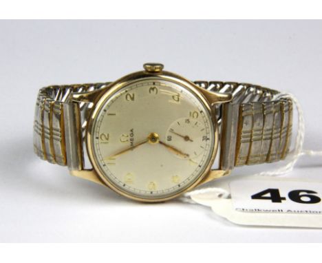 A gentleman's vintage 9ct gold Omega wrist watch, dial Dia. 3cm.