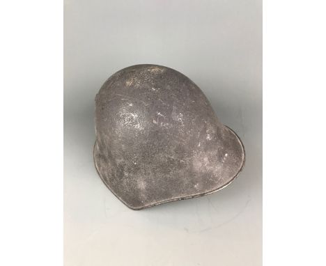 A 1918 Swiss helmet.