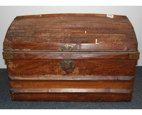 An early 20th century metal cabin trunk painted to resemble wood, size 68 x 48 x 46cm.