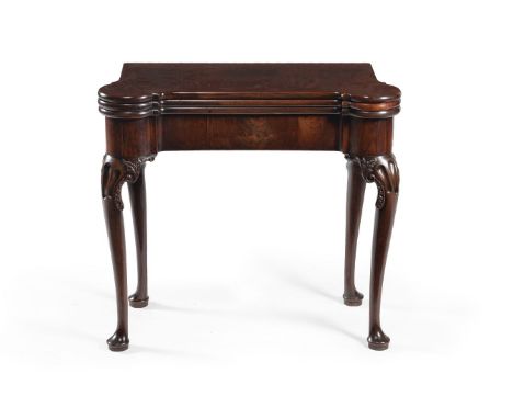 A George II mahogany combined tea and card table, probably Irish, circa 1760, the twin hinged rectangular top with outset fro