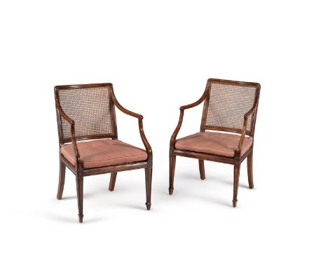 A set of six George III beech bergere armchairs, circa 1810, in the manner of Gillows, each caned rectangular back flanked by