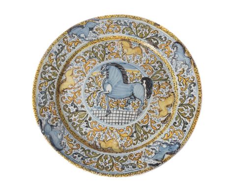 An Italian maiolica charger, probably Castelli, Abruzzo, late 17th/early 18th century, painted in shades of blue, manganese a
