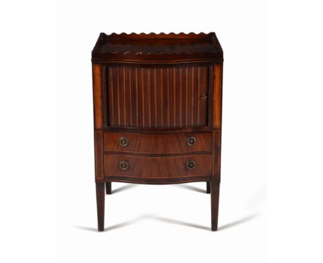 A George III mahogany and boxwood strung night commode, circa 1790, the serpentine top with shaped gallery, above a tambour d