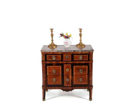 ϒA Louis XVI kingwood and marquetry petite commode, circa 1790, the variegated marble top with moulded edge above three long 