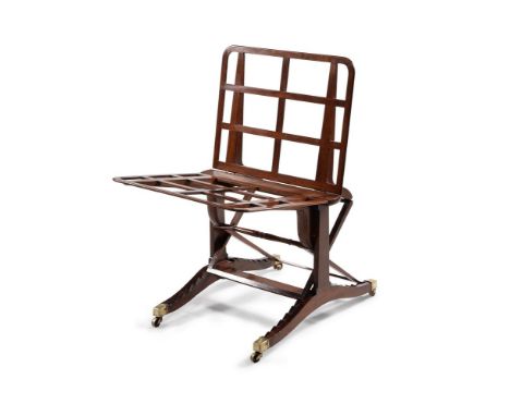A George IV mahogany adjustable folio stand, in the manner of Gillows, circa 1825,  the angle adjustable rests of trellis des