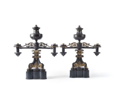 A pair of fine William IV parcel gilt and patinated metal twin light Argand table lamps, circa 1830 and later adapted for ele