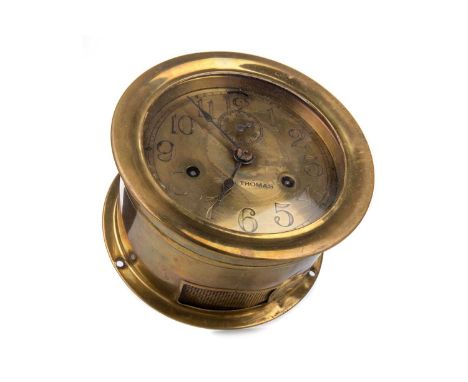 SETH THOMAS OF THE U.S., BRASS SHIP'S BULKHEAD CLOCK, with two train eight day movement, the brass dial set with Arabic numer