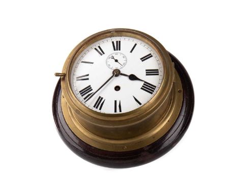 BRASS SHIP'S BULKHEAD CLOCK, with single train movement, the white enamel dial set with Roman numerals, subsidiary seconds di