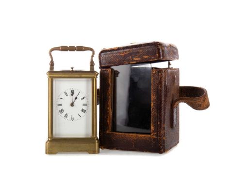 BRASS REPEATING CARRIAGE CLOCK, LATE 19TH / EARLY 20TH CENTURY with twin drum movement striking on a coil, the white enamel d