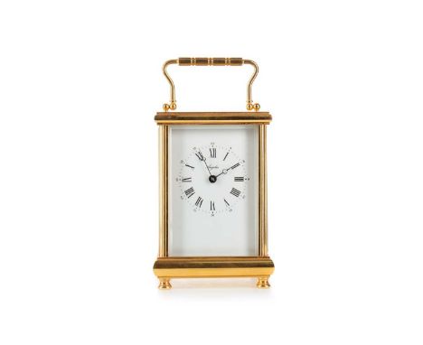 ANGELUS, BRASS CARRIAGE CLOCK, with two train movement striking on a bell, the white enamel dial set with Roman and Arabic nu