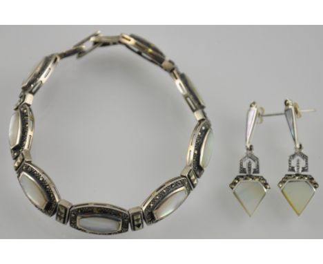 A pair of vintage silver mother of pearl and marcasite drop earrings together with a bracelet