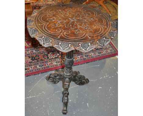 A late 19th Century Flemish carved oak wine table on scroll carved cabriole tripod