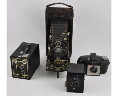 Four vintage cameras: a Kodak bellows example, two box types, and a bakelite model (4)
