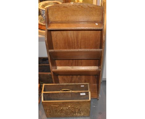 A 1920's oak magazine stand, 2 magazine racks and a vintage typewriter