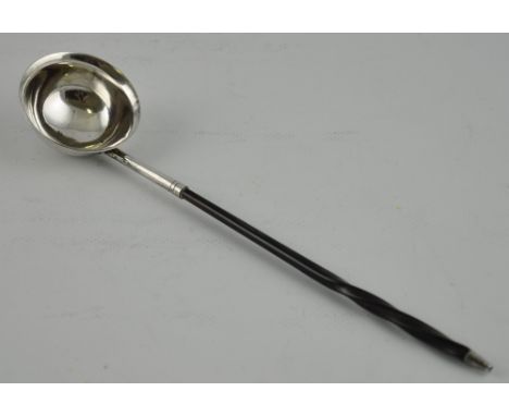 An early Victorian silver toddy ladle with twisted whalebone handle Birmingham 1842 by Taylor & Perry