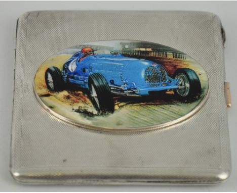 A silver and enamel card case decorated with the image of a Bugati