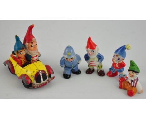 A vintage Corgi diecast Noddy car, L. 10cm together with four glazed ceramic Toyland figures (5)