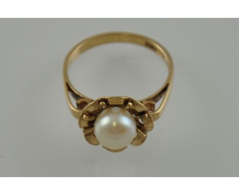 A vintage 9ct gold natural pearl ring