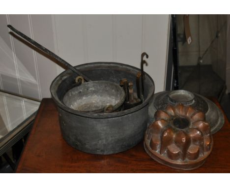 A small collection of assorted Eastern metalware including measures, a jelly mould, ladle etc