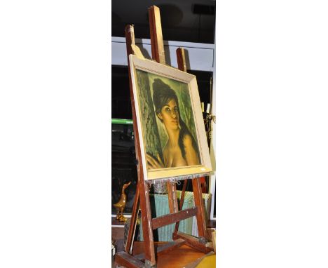 A beech studio easel, together with a travelling example, and a print (3)