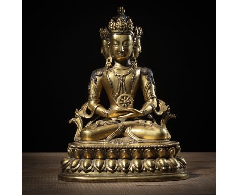 Vergoldete Bronze des vierköpfigen Buddha Vairocana auf einem Lotossockel sitzend, teilweise bemalt mit PigmentenTibetH. 35 c