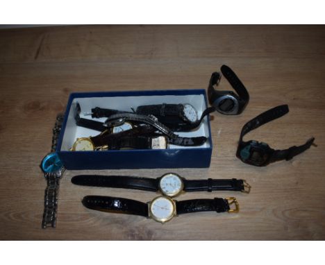 A tub of miscellaneous wristwatches, including a digital La Belle watch, plus watches by Lorus, Constant, Rojas, Charles Delo